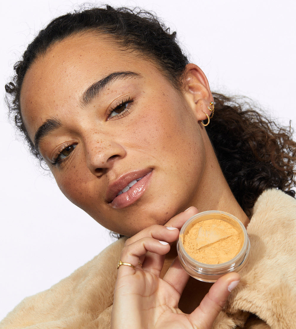 Arnelle showing how she gets her Golden Look using What The Foundation by Jones Road Beauty