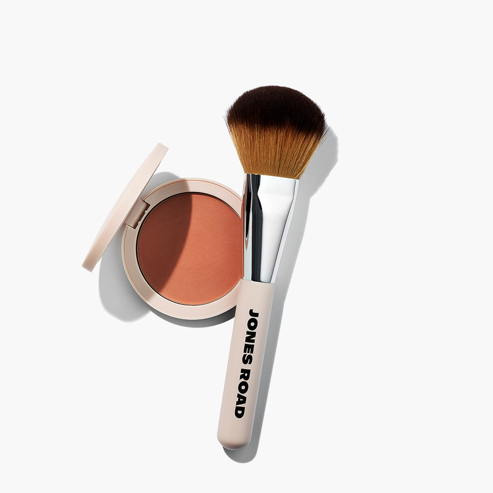The Bronzer Brush next to The Bronzer, both by Jones Road Beauty