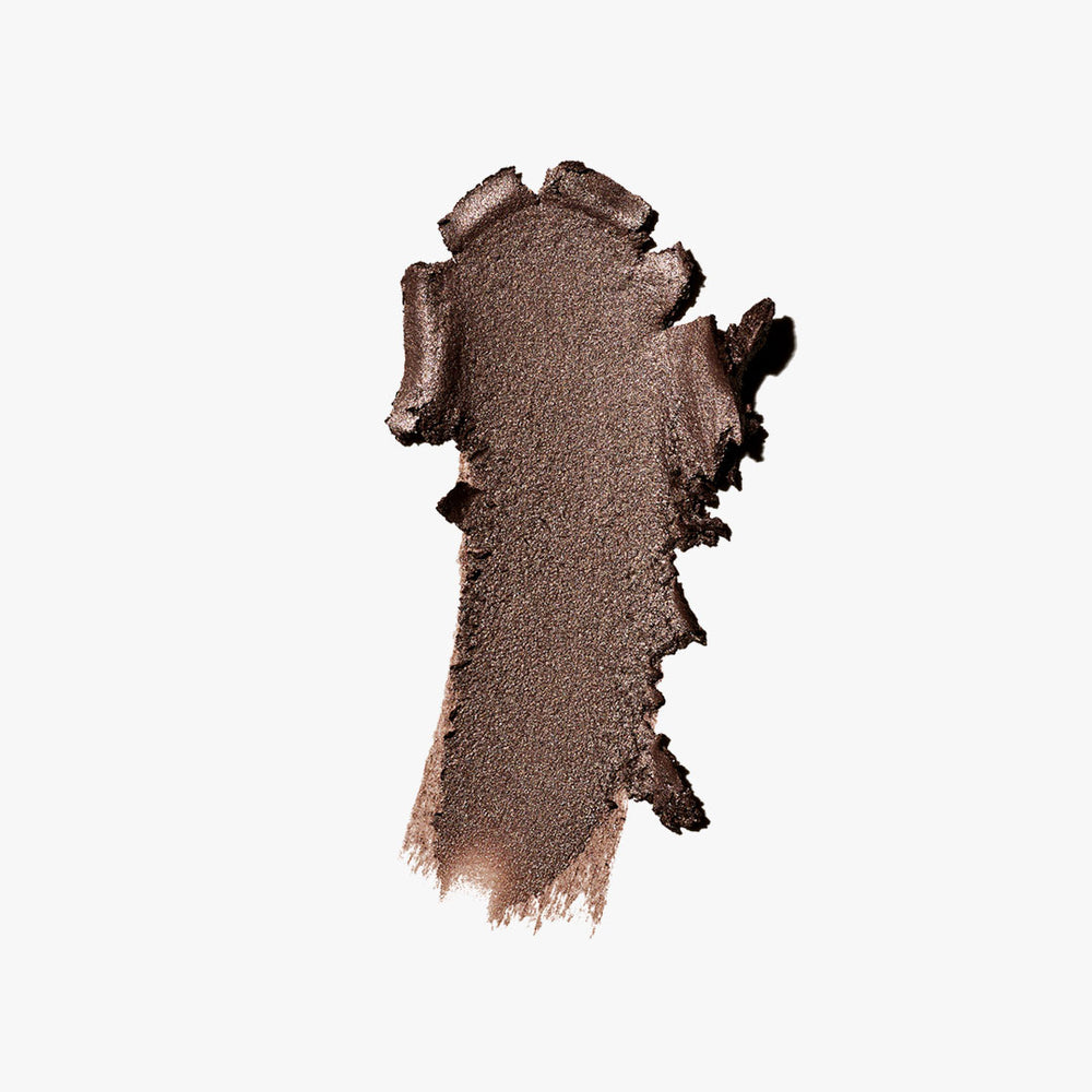A swatch of Jones Road Beauty's Just A Sec powder eyeshadow in the shade Pewter
