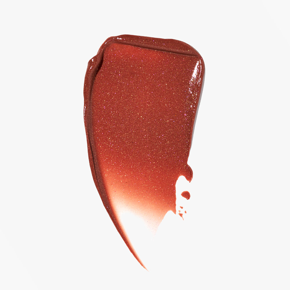 A swatch of Cool Gloss, a tinted lip gloss from Jones Road Beauty, in the shade Mocha Shimmer. 
