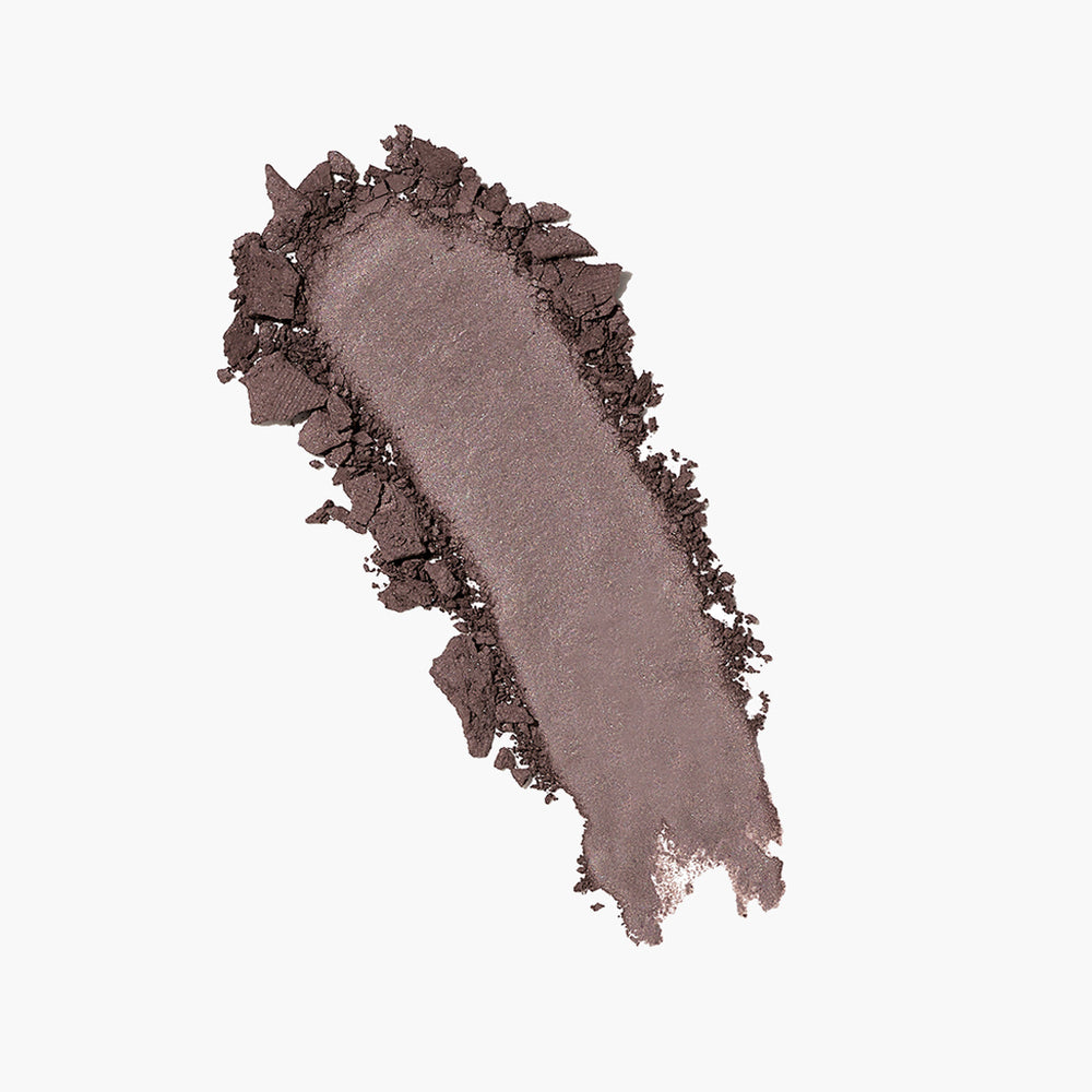 A swatch of Jones Road Beauty's The Best Eyeshadow in the shade Smokey Grey